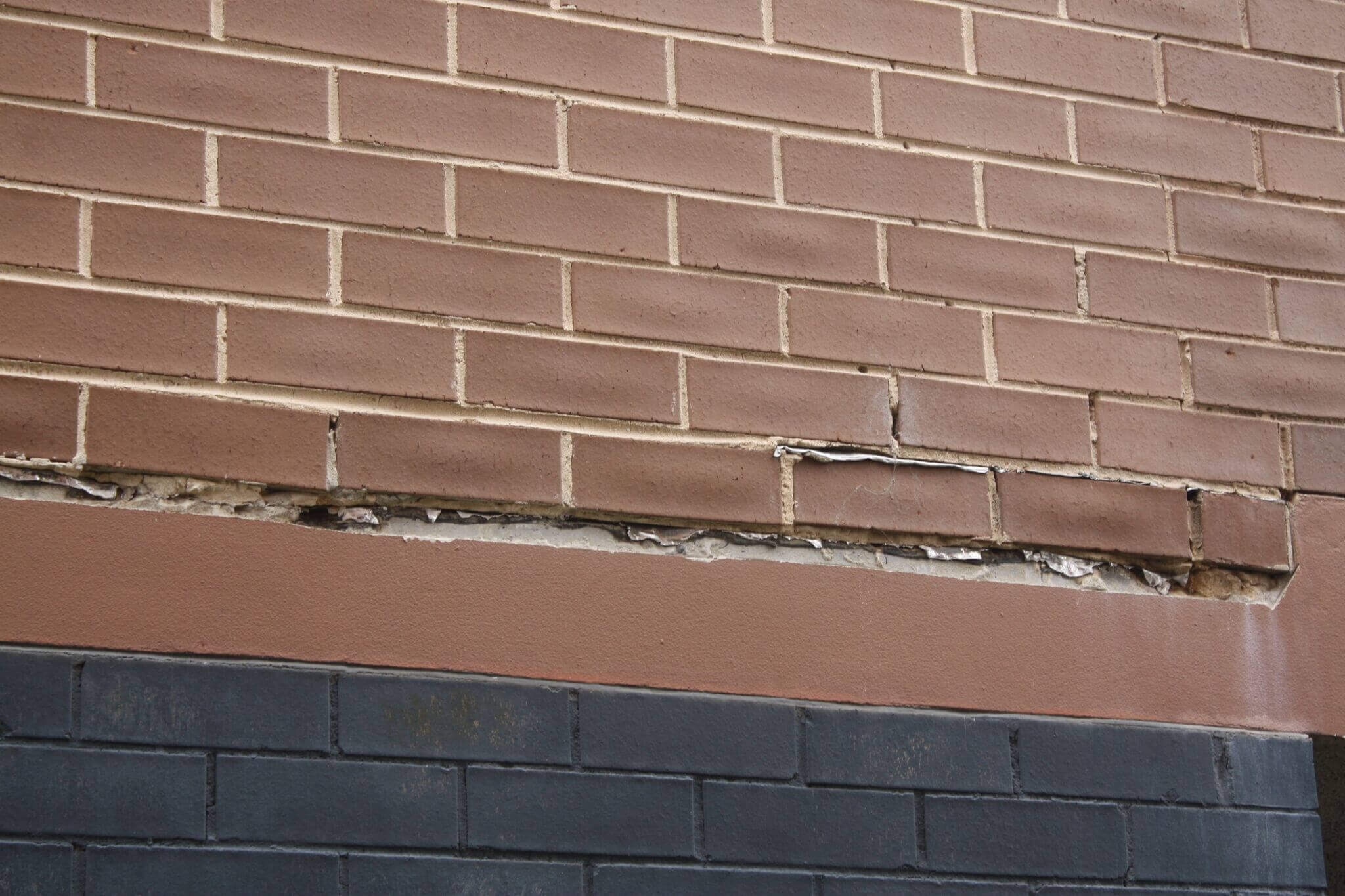 Cracks On Brick Wall - Concrete Spalling - Remedial Building Services