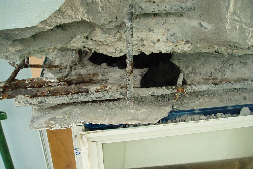 Rusted Reinforcement At The Window - Structural Building Repairs - Remedial Building Services